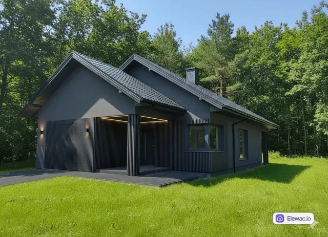 Wizualizacja AI: Odważna metamorfoza w stylu nowoczesnej stodoły. Jednolita ciemnografitowa elewacja nadaje budynkowi minimalistyczny, skandynawski charakter.